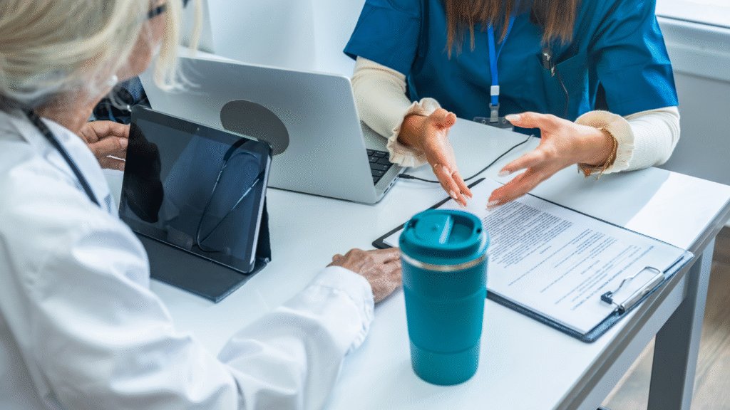 Pharmacist and patient discussing medication