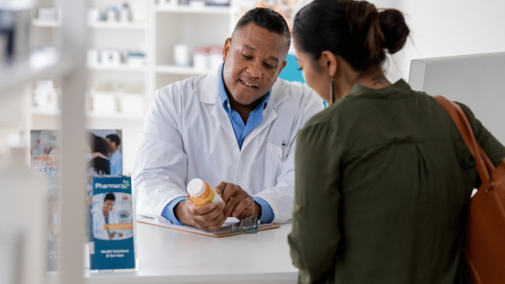 Patient discussing a refill with a pharmacist