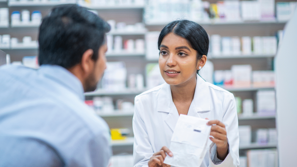 Pharmacist discussing policy with patient