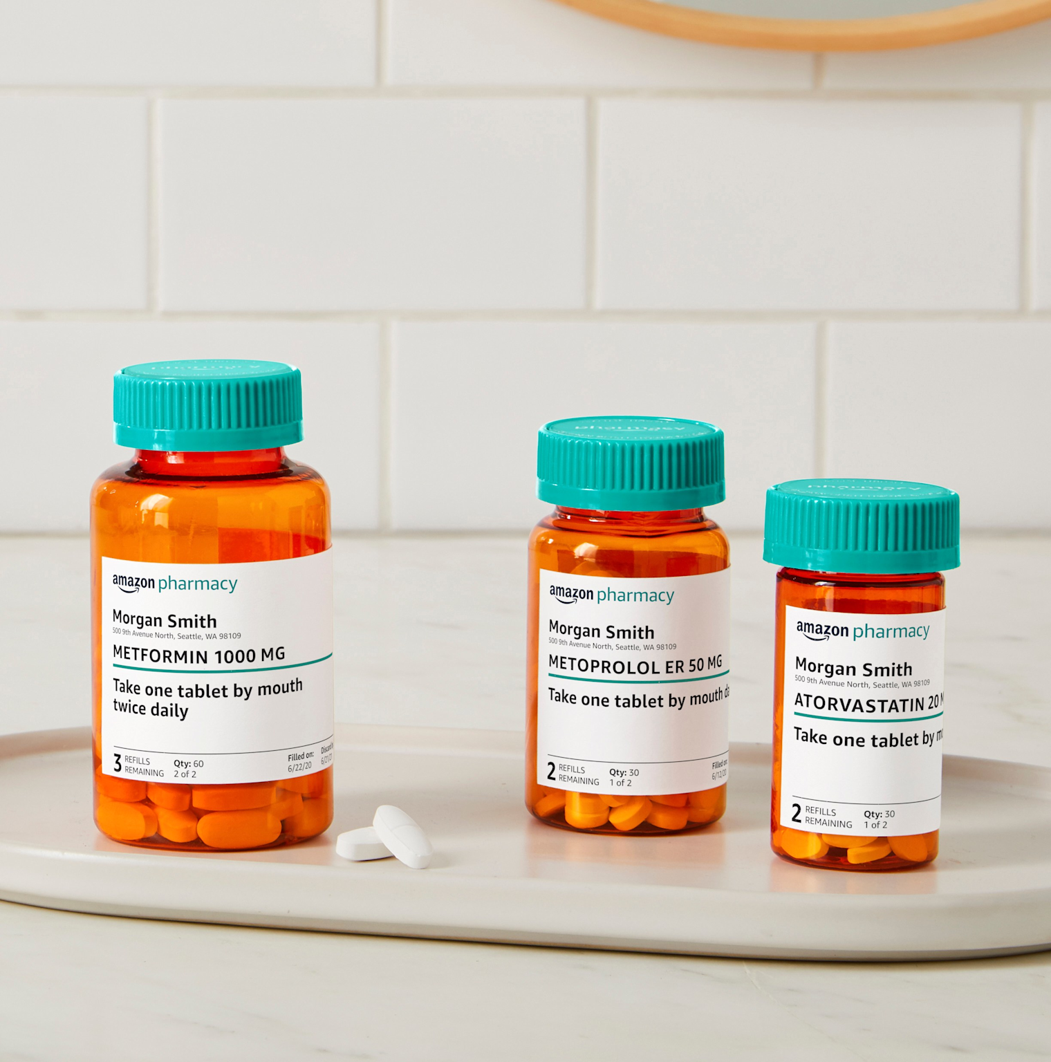 Prescription bottles from Amazon Pharmacy labeled with patient and medication information illustrating pharmacy delivery services